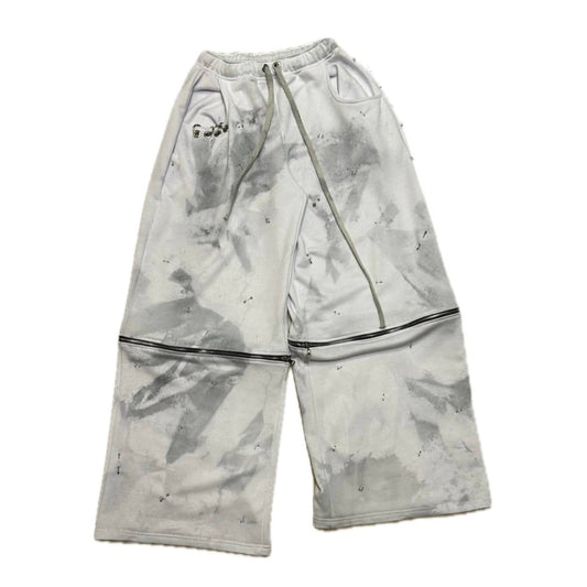 white piercing pants